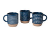 Three blue ceramic mugs with different patterns on a white background