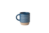 Blue ceramic mug with white stripes on a white background
