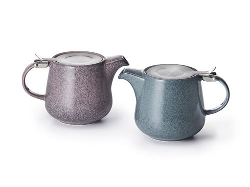 Two ceramic teapots, one purple and one blue, on a white background