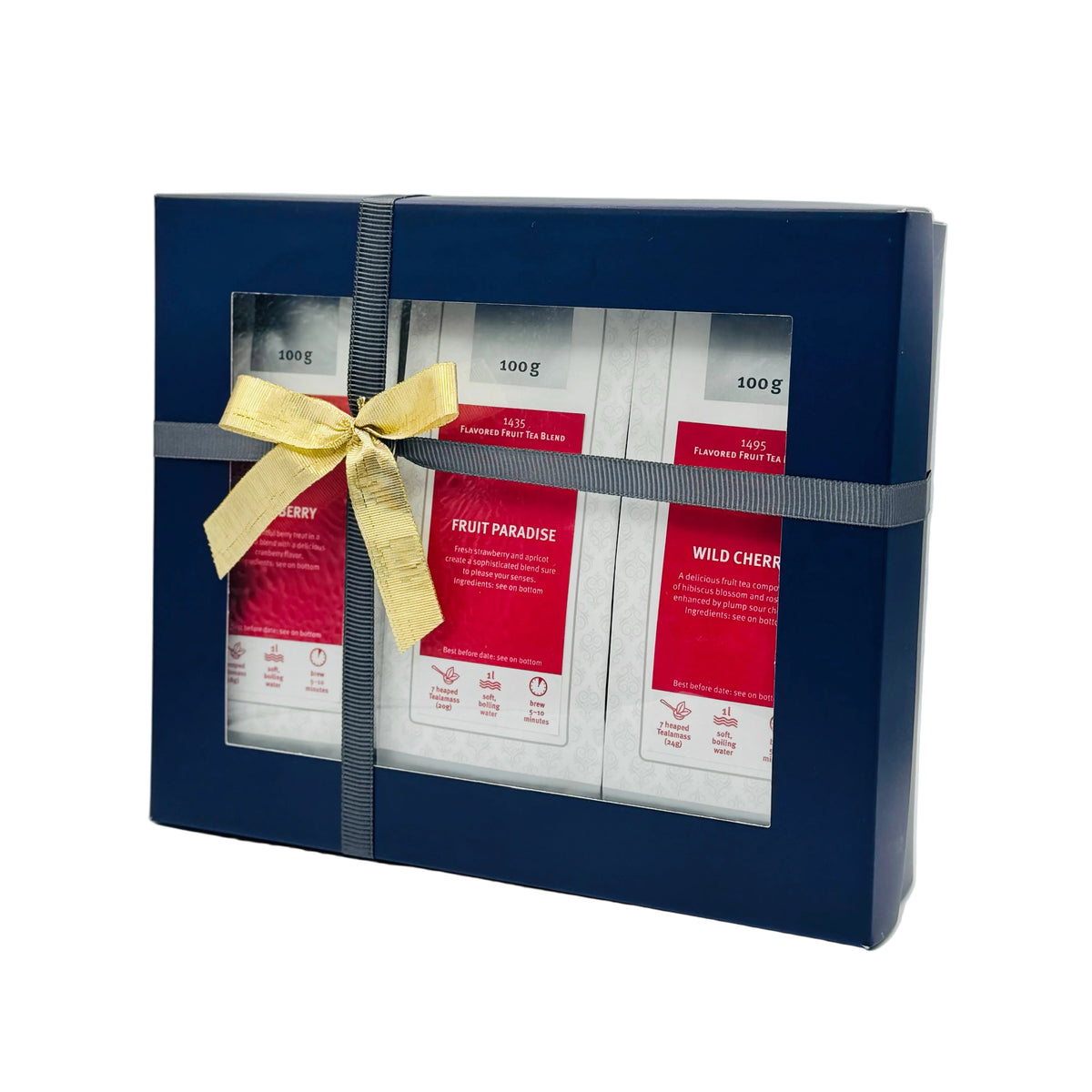 Gift set with red product packaging and a gold bow on a white background